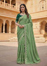 { "alt_text": "Pista Green georgette embroidered saree with unstitched blouse, 5.5Mtr ethnic wear, Indian fashion" }