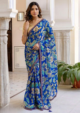{ "alt_text": "Blue georgette saree floral printed women's ethnic wear, 5.5mtr georgette saree with unstitched blouse" }