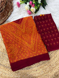 { "alt_text": "Orange-maroon georgette bandhani printed saree, 5.5m, ethnic wear, Indian wedding attire" }