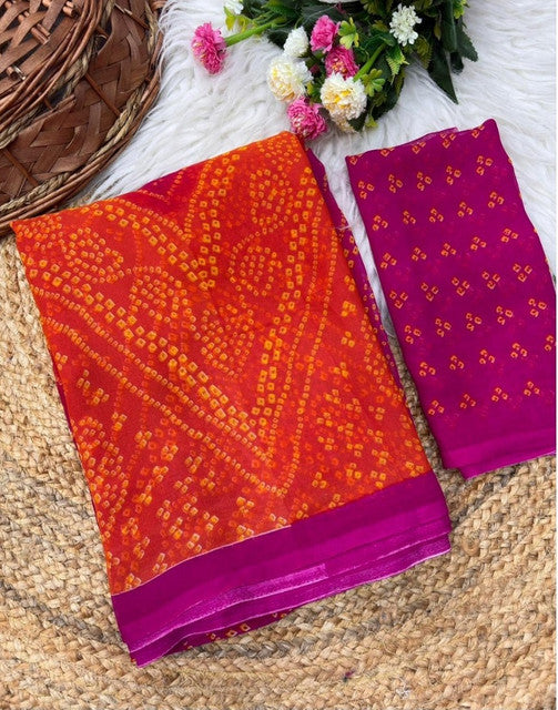 { "alt_text": "Orange-magenta georgette bandhani printed saree, 5.5m, ethnic wear, Indian wedding attire" }