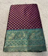 { "alt_text": "Purple jacquard printed saree with unstitched blouse, 5.5m, ethnic wear, Indian traditional clothing" }