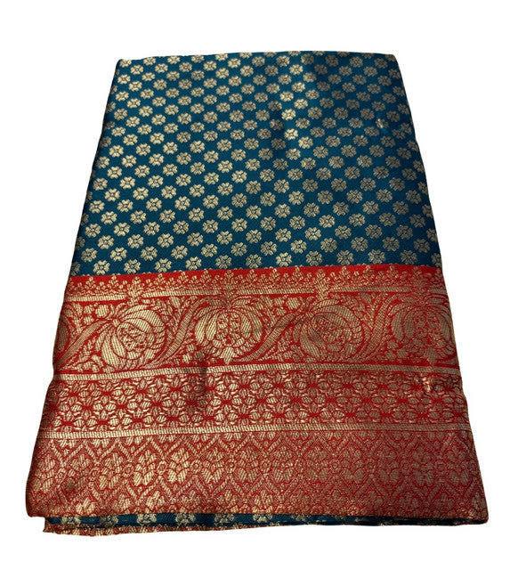 { "alt_text": "Teal jacquard printed saree with unstitched blouse, 5.5m, ethnic wear, Indian traditional clothing" }