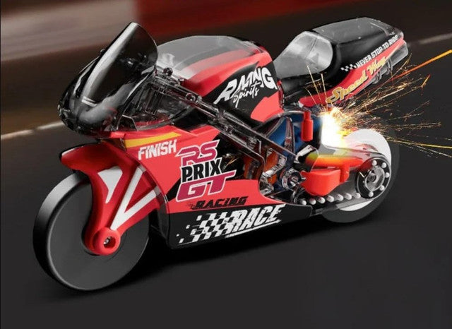 Multicolor plastic spark bike keychain toy with pull-back mechanism and wheelie stunt design