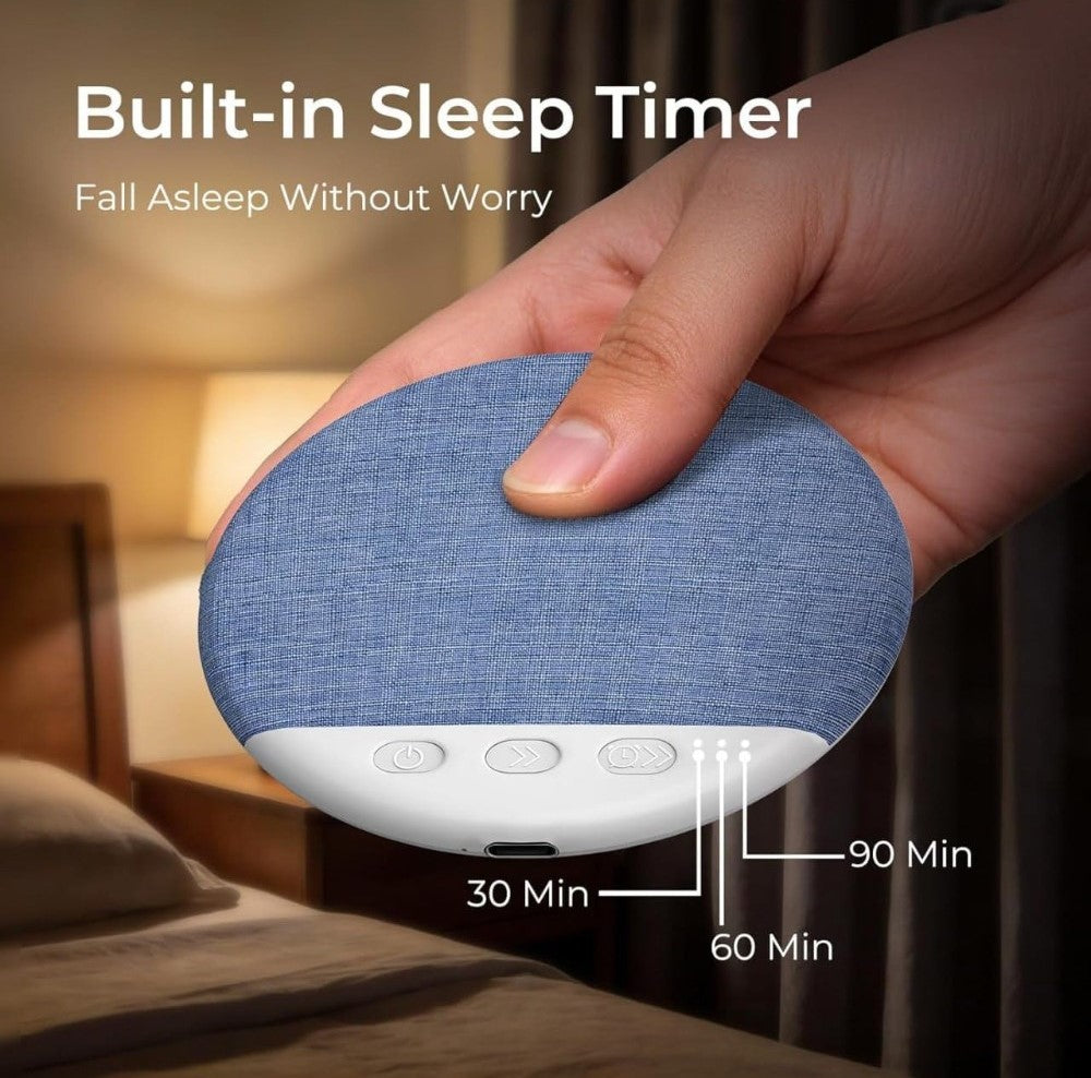 Blue plastic Bluetooth speaker designed to sit under a pillow for private, portable listening and white noise sleep aid