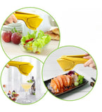 Yellow plastic manual citrus squeezer for lemons, limes, and oranges with strainer and ergonomic design