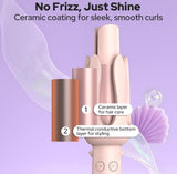 Pink plastic and stainless steel automatic hair curler with adjustable temperature settings for styling hair