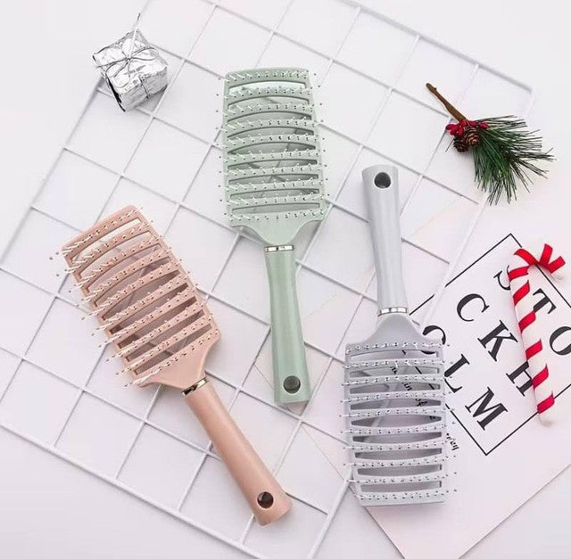Multicolor plastic detangling hair brush with vented design for wet or dry hair grooming