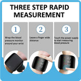 Black plastic digital blood pressure monitor for home use with adjustable wrist cuff and clear digital display