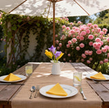 Green plastic napkin holder set designed to display folded paper or cloth napkins in a flower arrangement style