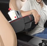 Black and red faux leather car arm rest cushion with memory foam, cup holders, and phone storage compartment