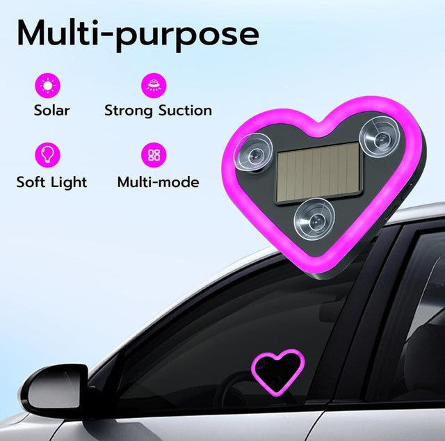 Pink heart-shaped neon car light with solar charging and multiple flashing modes for dashboard or window display