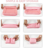 Pink nylon 7-piece travel packing cube set with various organizers for clothes, shoes, and toiletries