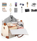 Beige faux leather and canvas 2-in-1 convertible travel duffel bag with shoulder strap and multiple pockets