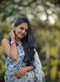 White and blue linen saree with floral print and unstitched blouse piece, 5.5 meters length