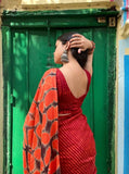 Red-orange linen floral printed saree with unstitched blouse piece, 5.5 meters length