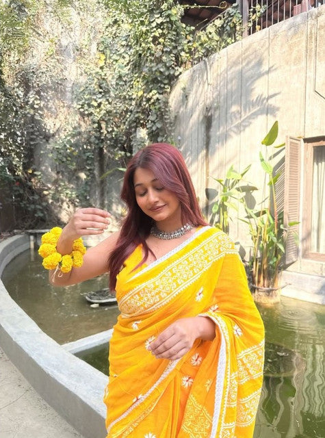 Yellow linen floral printed saree with unstitched blouse piece, 5.5 meters length