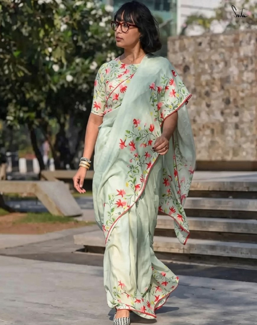 Light green linen saree with floral print and unstitched blouse piece, 5.5 meters length