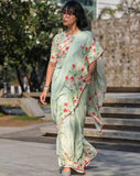 Light green linen saree with floral print and unstitched blouse piece, 5.5 meters length