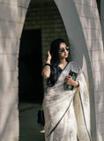 White and black linen floral printed saree with unstitched blouse piece, 5.5 meters length