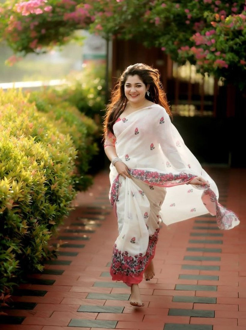 Off white linen saree with floral print and unstitched blouse piece, 5.5 meters length
