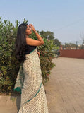 Off white linen printed saree with unstitched blouse piece, 5.5 meters length