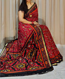 Red and black printed linen saree with unstitched blouse piece, 5.5 meters length
