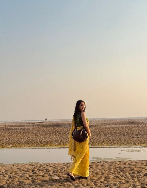 Yellow linen floral printed saree with unstitched blouse piece, 5.5 meters length