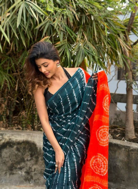 Teal and orange printed linen saree with unstitched blouse piece, 5.5 meters length