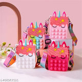 Unicorn-themed silicone sling bag, stress relief travel pouch for girls, adjustable crossbody shoulder bag with pop it fidget feature, self-design net pattern, made in India