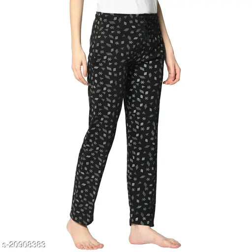 Multicolor cotton blend printed straight-fit trousers for women, featuring vibrant patterns on display. Available in sizes 32-38 (waist 28in-34in, length 38in-41in)