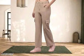 Comfy cotton-lycra solid net women's trousers for casual, everyday wear & party events. Deep side pockets and belt loops for practicality. Relaxed fit, full-length, and versatile style. India origin