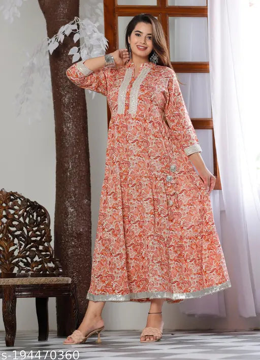 Orange rayon kurti gown, vibrant printed three-quarter sleeves for parties, Indian craftsmanship