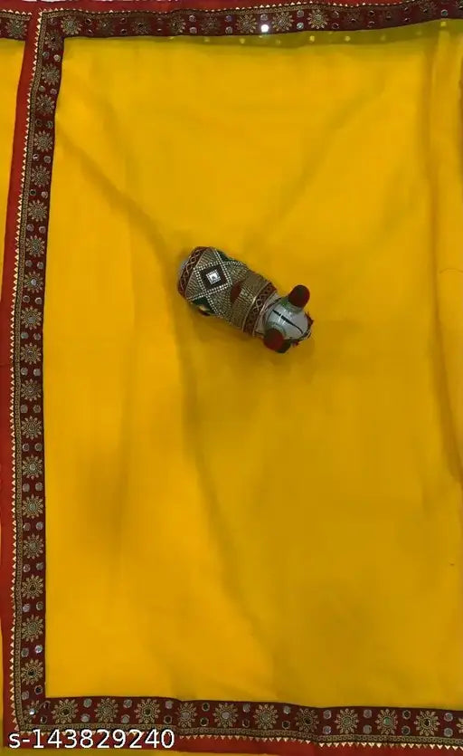 Yellow Georgette saree with satin blouse, featuring zari woven mirror work and stone lace. Made in India, single beautiful piece." (124 characters)