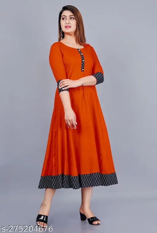 Unique Stylist women's solid printed round pleated flared kurti (orange), 100% rayon with 3/4 sleeves, suitable for casual and formal occasions, machine washable