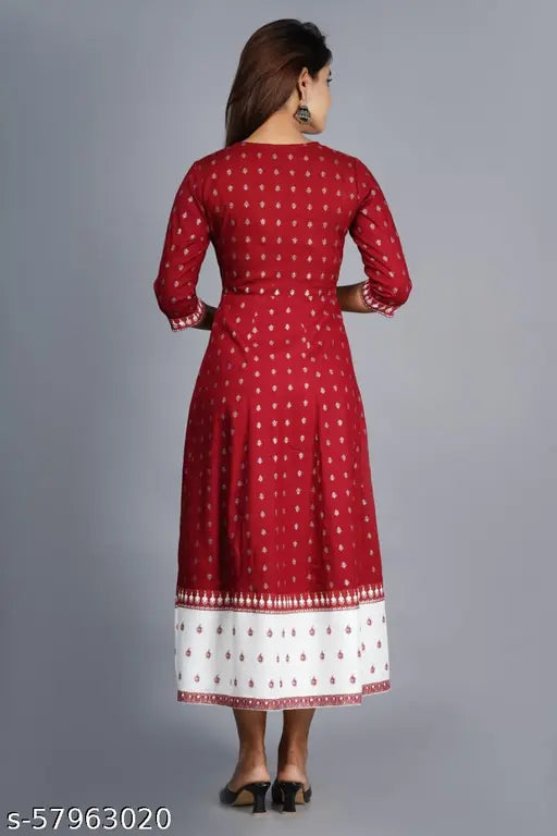 Black printed rayon straight kurti with three-quarter sleeves, featuring intricate ethnic designs. Indian women's fashion