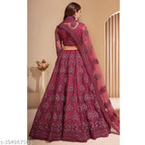 Designer embroidered net lehenga set in free size, with choli and dupatta. Embroidered details on net fabric from India