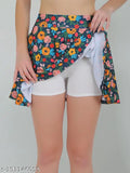 Green floral printed polyester mini skirt with attached inner shorts, high elasticity and double-layer design for versatile occasions