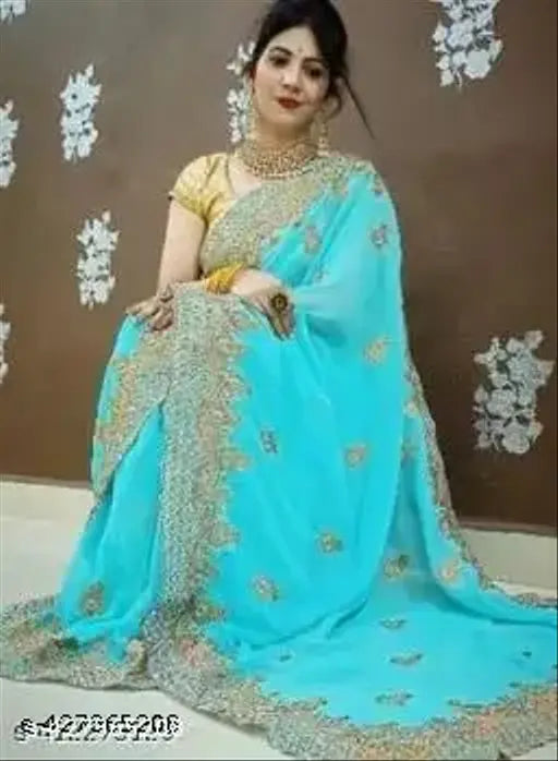 Georgette embroidered sari with Bangalori silk blouse, intricate Indian embroidery on display