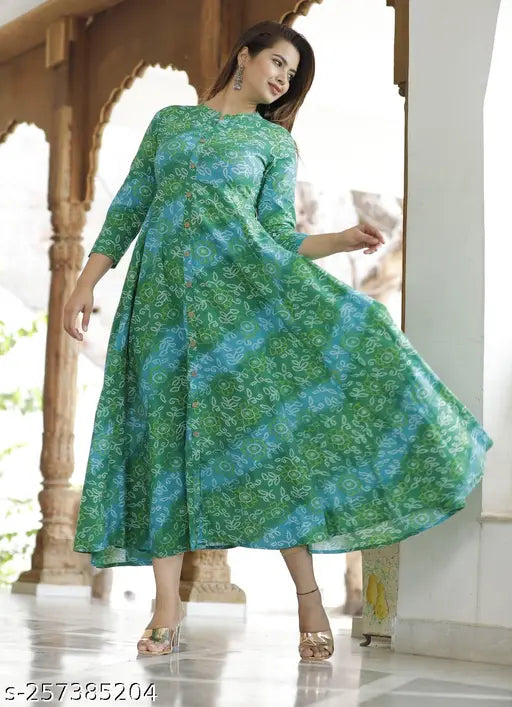 Green cotton bandej printed anarkali dress kurta, three-quarter sleeves, Indian ethnic wear for women on mannequin