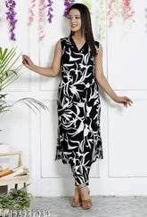 Black set party wear dress - rayon, sleeveless kurta with palazzos, printed net pattern on display