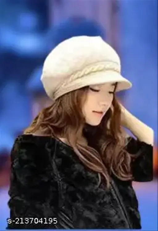 Women's/Girls woolen beanie cap with fur inside, visor & viscor type. Comfortable, fashionable, and warm for cold winters." (93 characters)