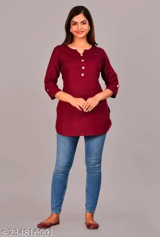 Maroon crepe-printed Rayon kurti for women, high-quality three-quarter sleeve tunic top with side overlock stitching on display stand