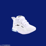 White canvas and rubber kids' running shoes with LED lights, ideal for boys. Lace-up design, memory foam insole, available in various sizes from 18-24 Months to 6-6.5 Years. Made in India