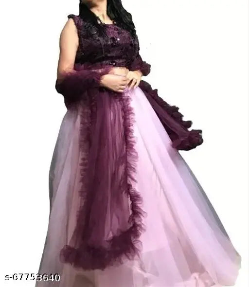 Pink net Chaniya Choli with wine blouse, Indian bridal partywear featuring jute silk top, net bottom, and ruffle dupatta with embroidery detail. Semi-stitched, perfect for weddings, parties, or festivals