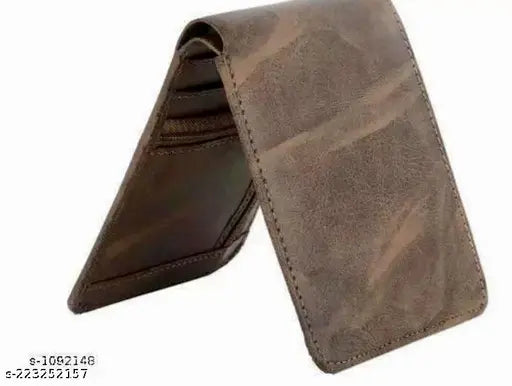 Brown PU dual zipper artificial wallet with 5 compartments, solid pattern, and free size. High-quality classic design for organizing personal items elegantly. Hand-stitched, dry clean only. Slim feel and gift boxed. Dimensions: 12x10x2 cm