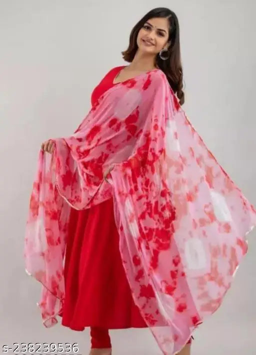 Solid red rayon Anarkali kurta with attached dupatta, elegant design for festive occasions. Indian-made." (125 characters)