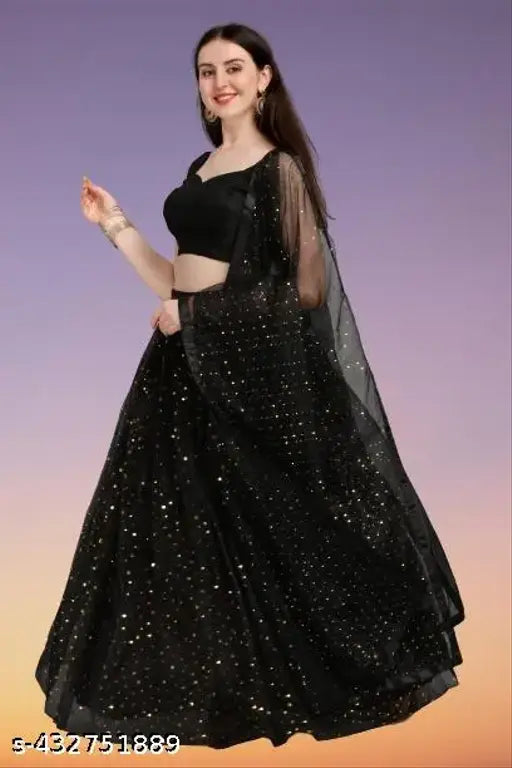 Silk and net embroidered Lehenga-Choli set with embellished dupatta. Semi-stitched, waist size 42 inches, length 42 inches for bottom and dupatta length 70 inches. Indian traditional wear