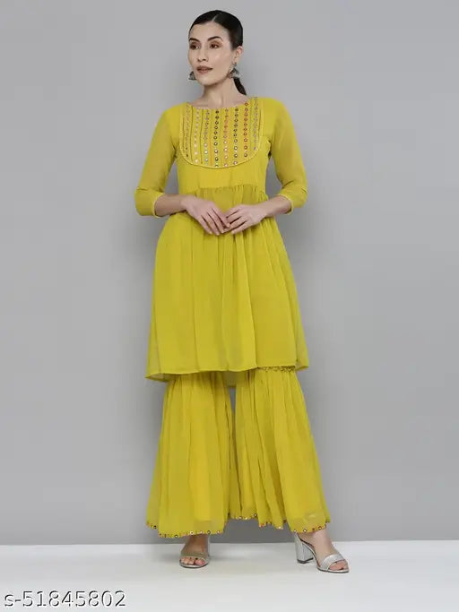 Lime yellow Georgette embroidered kurta with sharara, partial elastic waistband. Vibrant mirror work and geometric patterns, festive Indian attire." (123 characters)