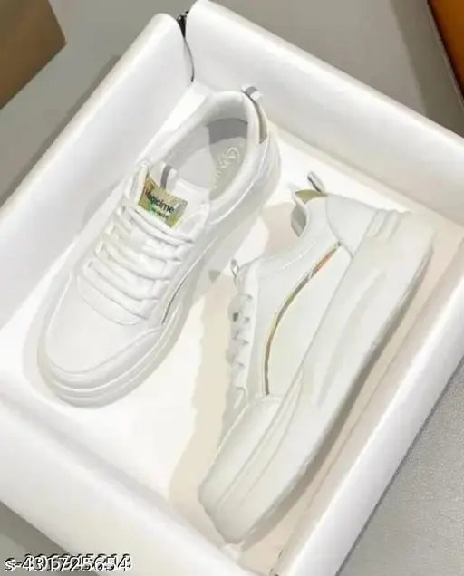 Stylish gold synthetic sneakers for girls, lightweight upper with PVC sole, lace-up fastening, breathable netting. Indian-made casual footwear for active, comfortable wear