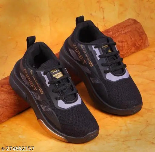 Black canvas and EVA lace sneakers for kids, ideal for running, walking, and casual wear. Air them regularly to de-odorize. Textured net pattern with lace-up fastening. Unisex sizes available. Made in India